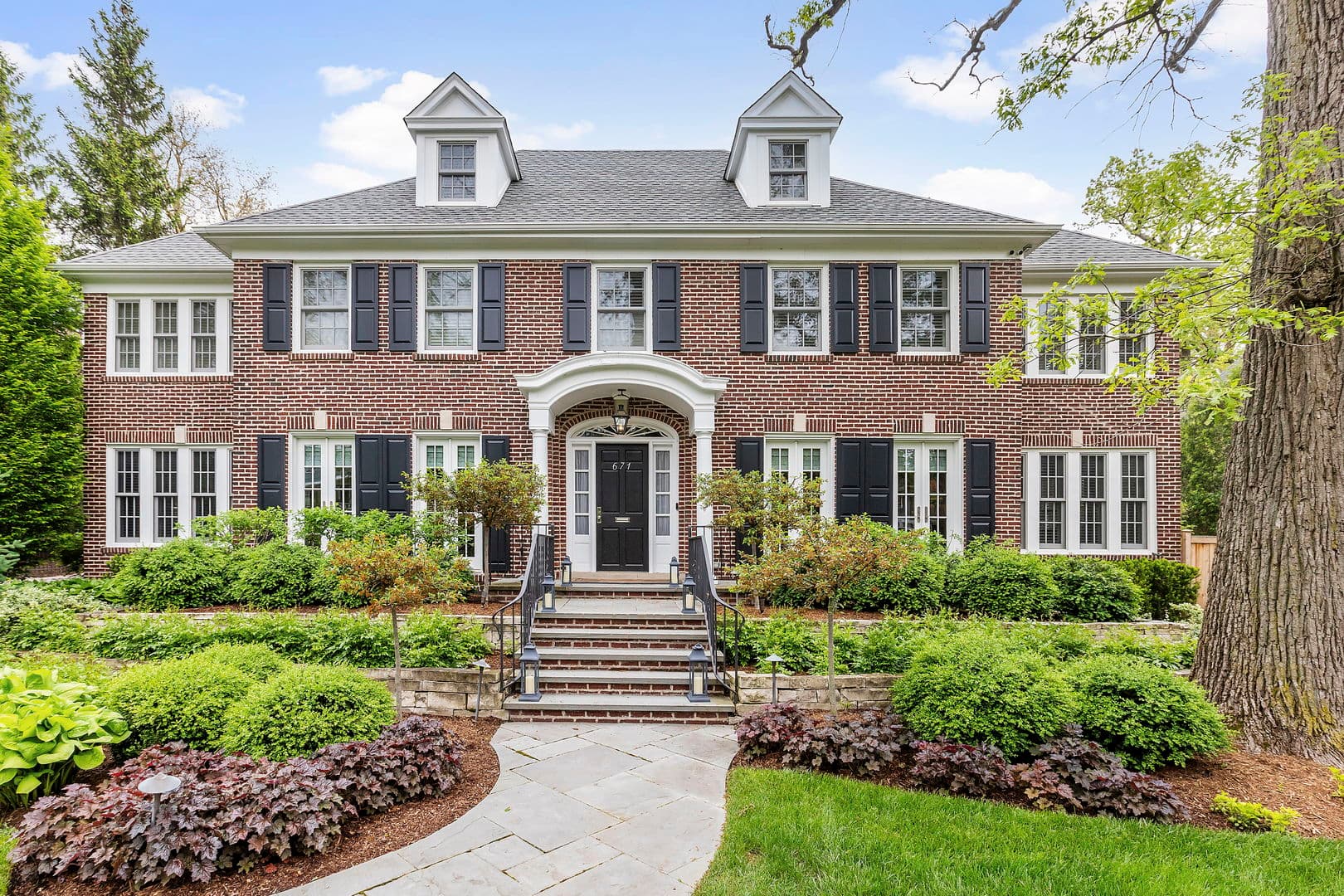 McCallister residence, 671 Lincoln Avenue, Winnetka, IL — a brick Georgian Colonial Revival home, built 1921